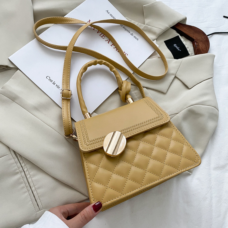 Handtasche für Damen ⎜ Stilvolle Umhängetasche mit strukturierter Optik und elegantem Drehverschluss
