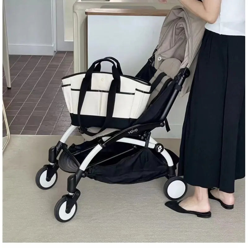 Wickeltasche für Eltern ⎜ Geräumige Tragetasche aus Canvas mit mehreren Fächern und praktischem Flaschenhalter