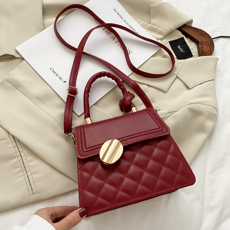 Handtasche für Damen ⎜ Stilvolle Umhängetasche mit strukturierter Optik und elegantem Drehverschluss
