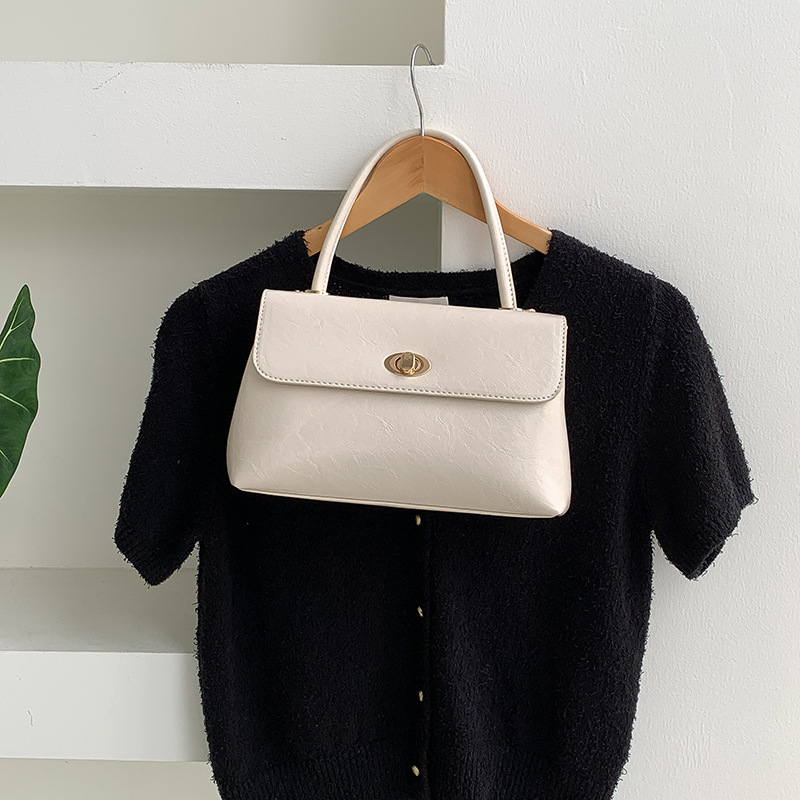Handtasche für Damen ⎜ Elegante Umhängetasche in Lederoptik mit Drehverschluss und stabilem Tragegriff