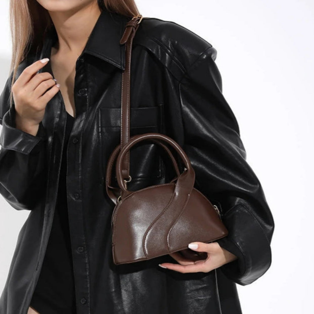 Handtasche für Damen ⎜ Kompakte Schultertasche in Muschelform mit elegantem Design für Alltag und Events