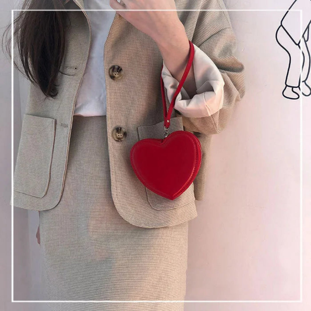 Mini-Handtasche für Damen ⎜ Herzförmige Wrist-Bag mit Handschlaufe für unterwegs und besondere Anlässe