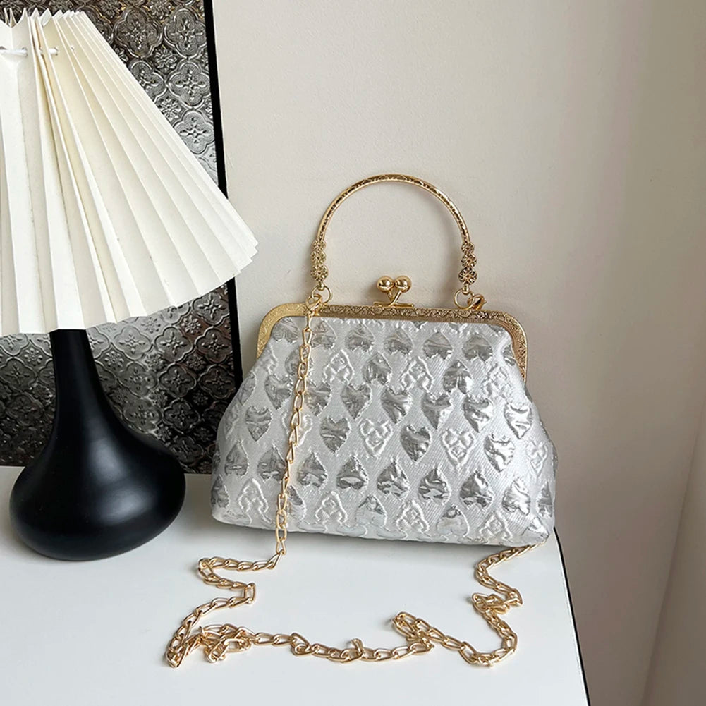 Kleine Umhängetasche für Damen ⎜ Glänzendes Design mit Herzmuster und Metallrahmen für stilvolle Anlässe