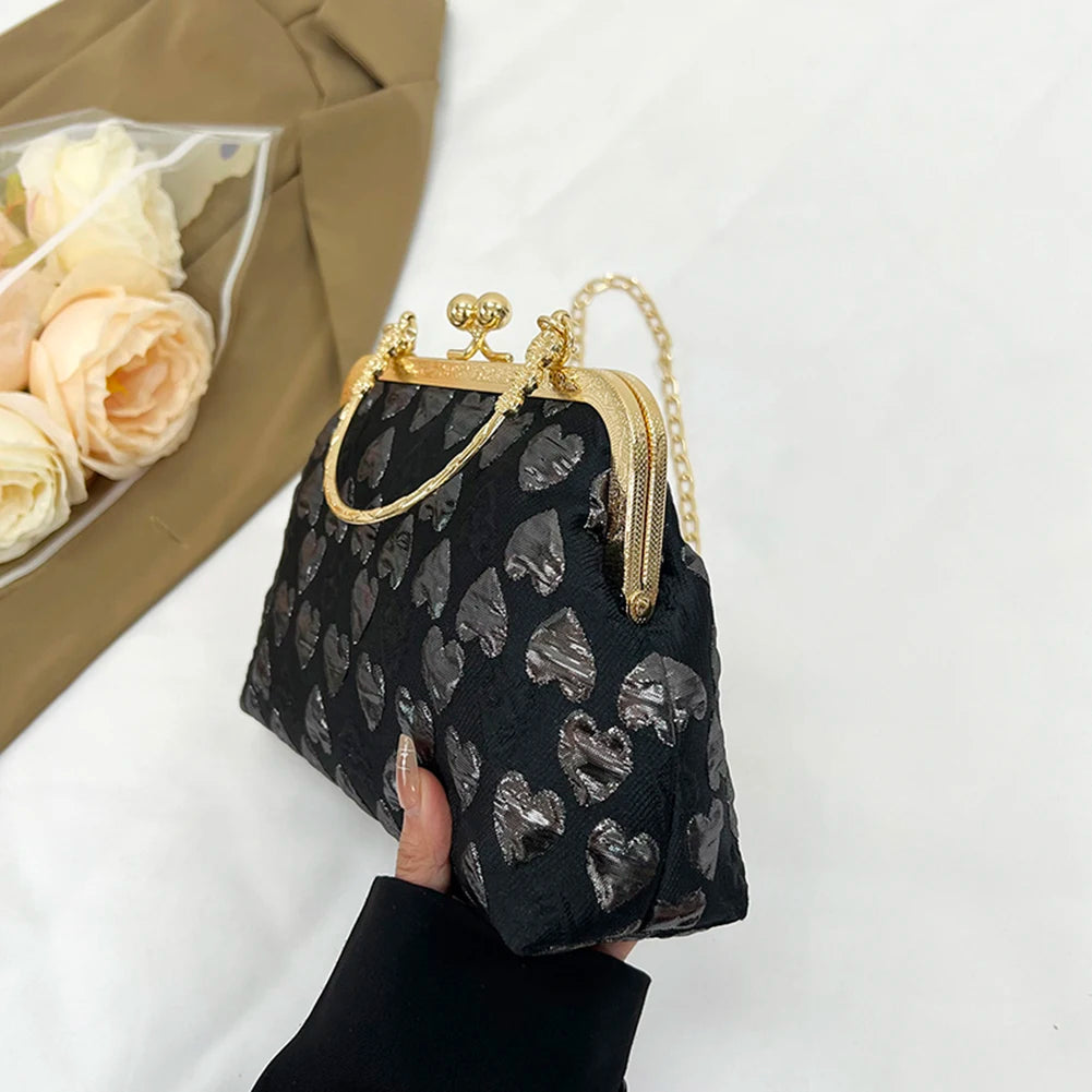 Kleine Umhängetasche für Damen ⎜ Glänzendes Design mit Herzmuster und Metallrahmen für stilvolle Anlässe