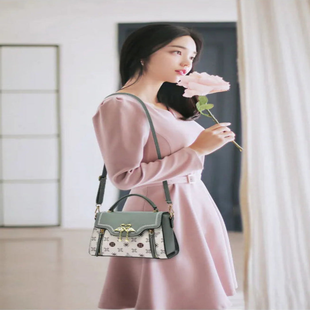 Handtasche für Damen ⎜ Modische Schultertasche mit Printmuster und dekorativem Verschluss für stilvolle Outfits