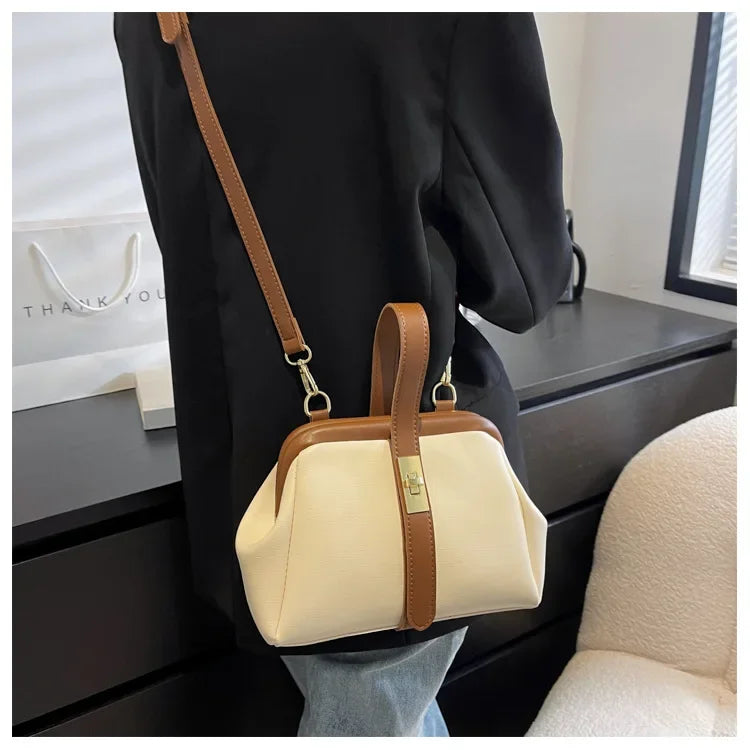 Damen Umhängetasche ⎜ Kompakte Retro-Tasche mit Clipverschluss für Alltag und elegante Outfits