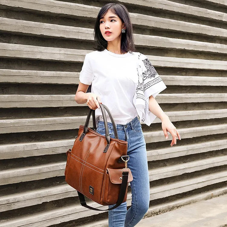 Handtasche für Damen ⎜ Geräumige Schultertasche in Lederoptik mit Seitenfächern und Tragegurt